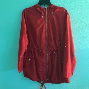 red windbreaker